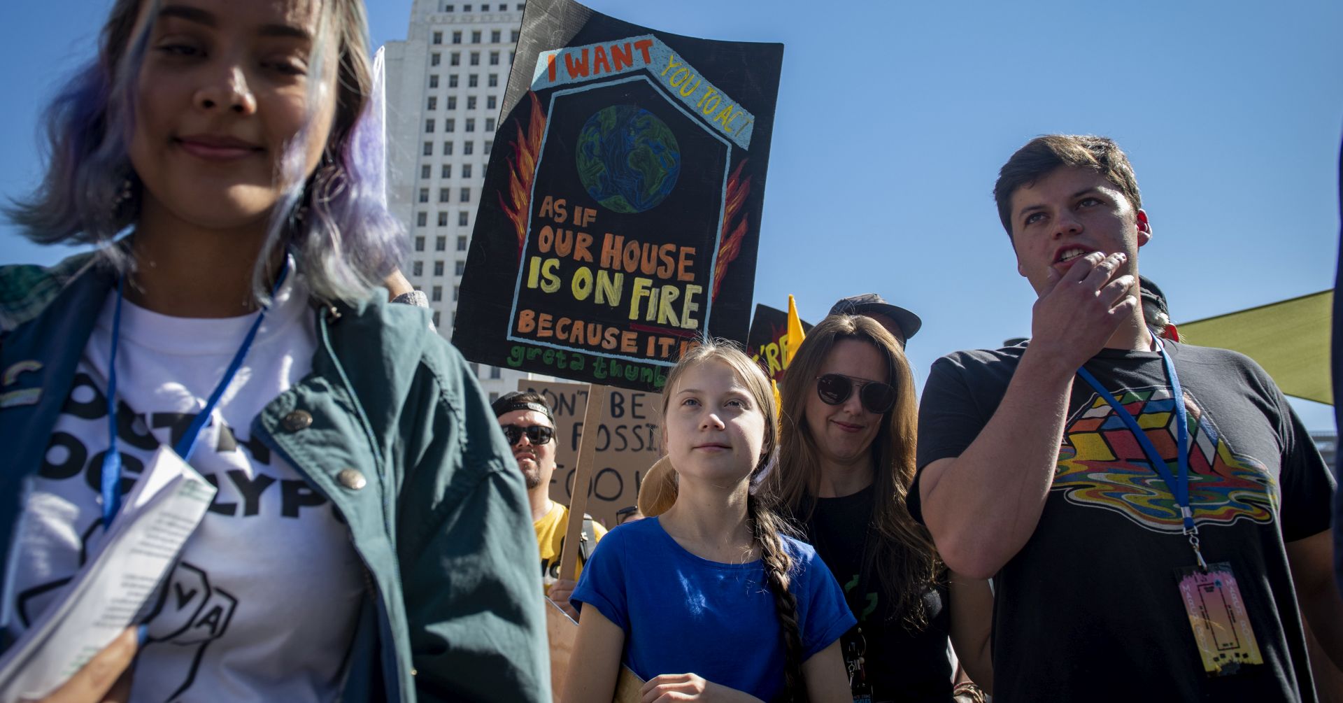 epa07965725 Greta Thunberg marches in front of Los Angeles City Hall at the Youth Climate Strike in Los Angeles, California, USA, 01 November 2019. Several hundred people gathered and marched through the streets to demand elected officials take action against the climate crisis.  EPA/CHRISTIAN MONTERROSA