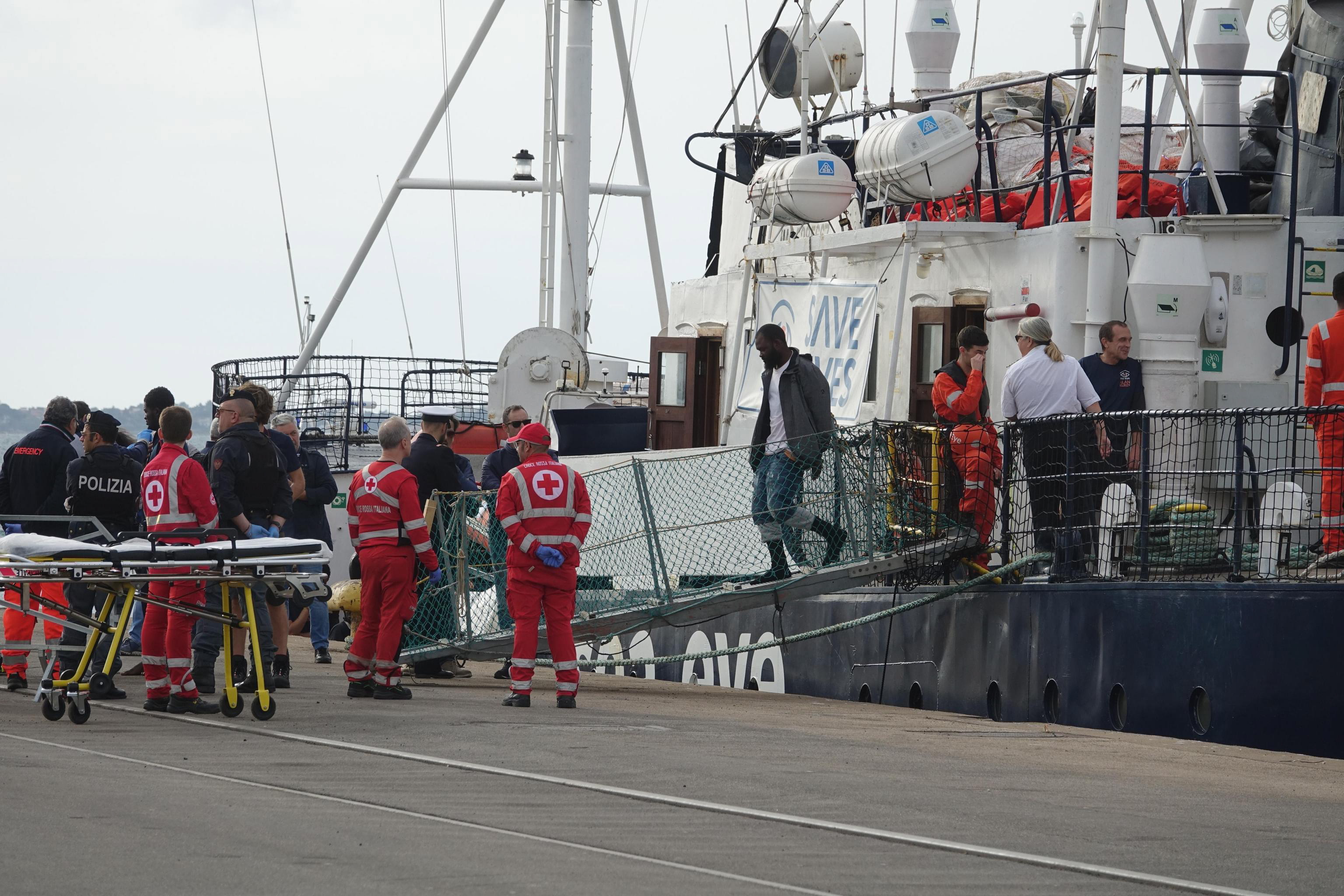 epa07969118 Rescued migrants arrive aboard 'Alan Kurdi' rescue vessel at the port of Taranto, southern Italy, 03 November 2019. The 88 migrants have been rescued in recents days by 'Alan Kurdi' rescue vessel.  EPA/RENATO INGENITO
