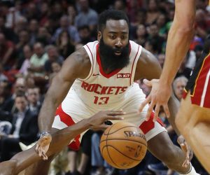 epaselect epa07970745 Houston Rockets James Harden (yop) defends Miami Heat guard Jimmy Butler (bottom) during the NBA basketball game between the Miami Heat and the Houston Rockets at the AmericanAirlines Arena in Miami, Florida, USA 03 November 2019.  EPA/RHONA WISE  SHUTTERSTOCK OUT