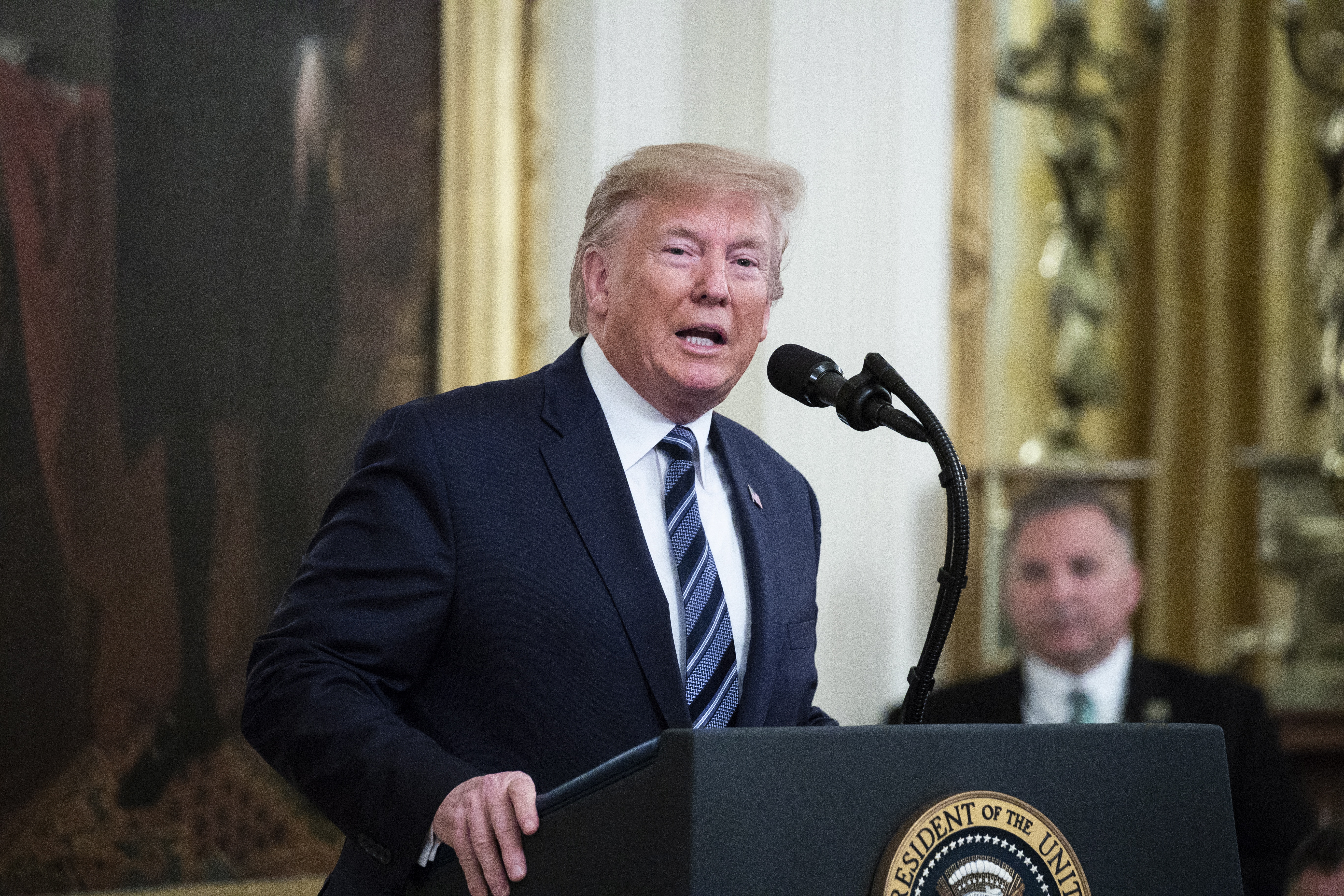 epa07980269 US President Donald J. Trump delivers remarks during a ceremony in which he awarded the Presidential Citizens Medal posthumously to veteran Rick Rescorla, in the East Room of the White House in Washington, DC, USA, 07 November 2019. Rick Rescorla is credited for saving almost 2,700 lives in an emergency evacuation during the 9/11 terrorist attack in New York in 2001.  EPA/MICHAEL REYNOLDS