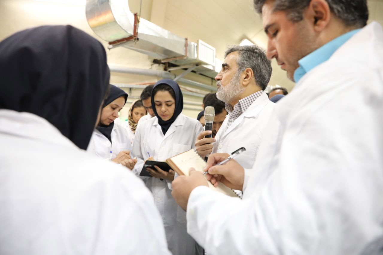 epa07983321 A handout photo made available by the Iran Atomic Energy Organisation shows Iran's Atomic Energy Organisation Behrouz Kamalvandi (2-R) talking with local journalists inside of the Iran's Fordow nuclear facility, in Fordow, Qom province, 09 November 2019. Media reported following president Rouhani's announcement of the country's fourth step in reducing its nuclear commitment to the Joint Comprehensive Plan of Action (JCPOA), Iran started injecting uranium gas into 1,044 advanced centrifuges'.  EPA/HANDOUT  HANDOUT EDITORIAL USE ONLY/NO SALES