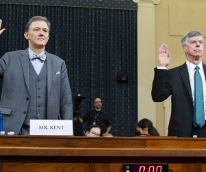 epa07993334 Charge d'Affaires at the US embassy in Ukraine Bill Taylor (R) and Deputy Assistant Secretary of State for Europe and Eurasia George Kent (L) are sworn-in to testify before the House Permanent Select Committee on Intelligence hearing on the impeachment inquiry into US President Donald J. Trump, on Capitol Hill in Washington, DC, USA, 13 November 2019. This is the first public hearing of the impeachment inquiry. The inquiry being led by three congressional committees was launched following a whistleblower's complaint that alleges US President Donald J. Trump requested help from the President of Ukraine to investigate a political rival, Joe Biden and his son Hunter Biden.  EPA/MICHAEL REYNOLDS