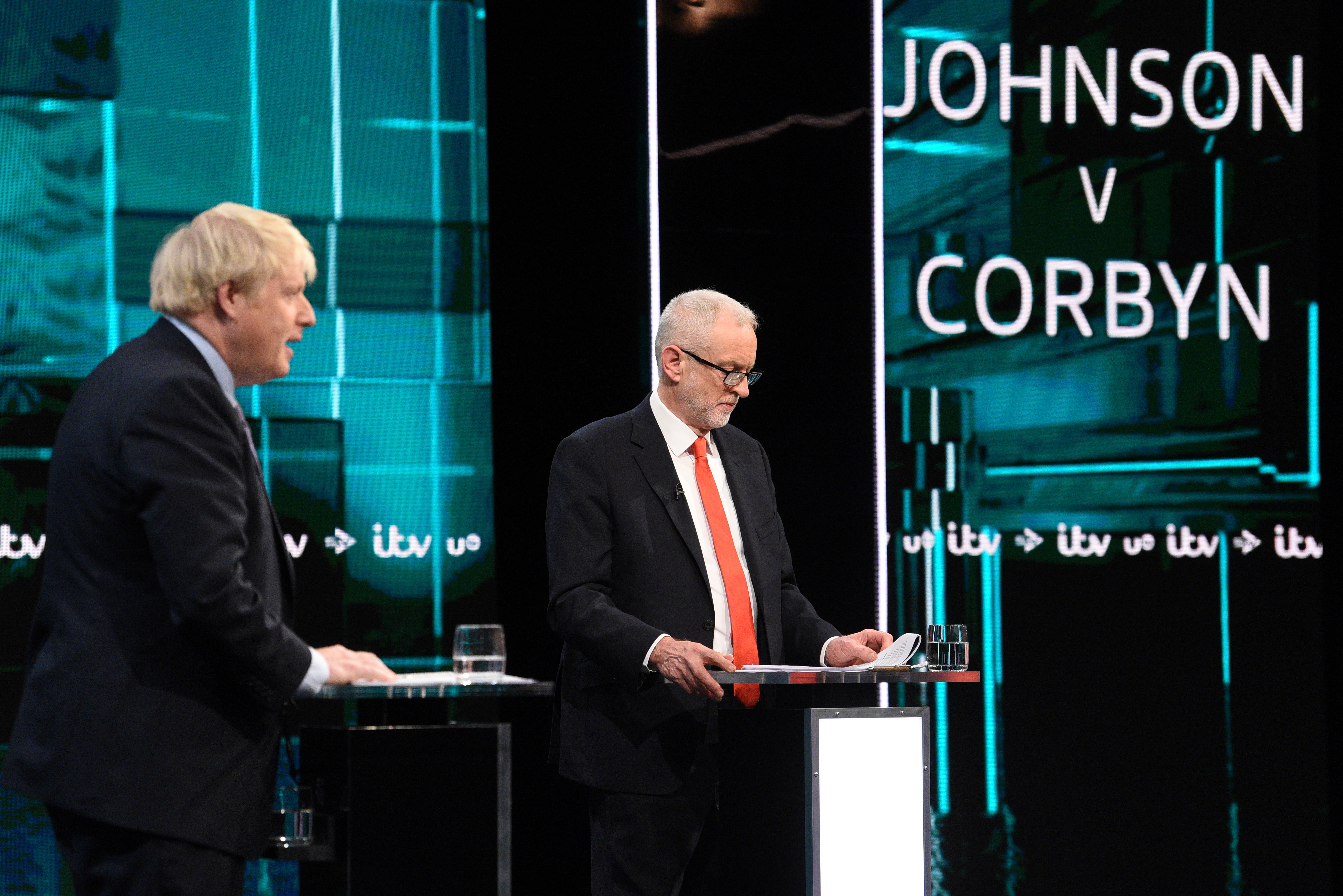 epa08009710 A handout photo made available by ITV shows British Prime Minister and Conservative Party leader Boris Johnson (L) and Labour Party leader Jeremy Corbyn (R) during live debate 'Johnson v Corbyn: The ITV Debate', at ITV Studios in Manchester, Britain, 19 November 2019.  EPA/JONATHAN HORDLE / ITV / HANDOUT MANDATORY CREDIT: JONATHAN HORDLE / ITV EDITORIAL USE ONLY UNTIL 19 DECEMBER 2019 / HANDOUT NO SALES HANDOUT NO SALES