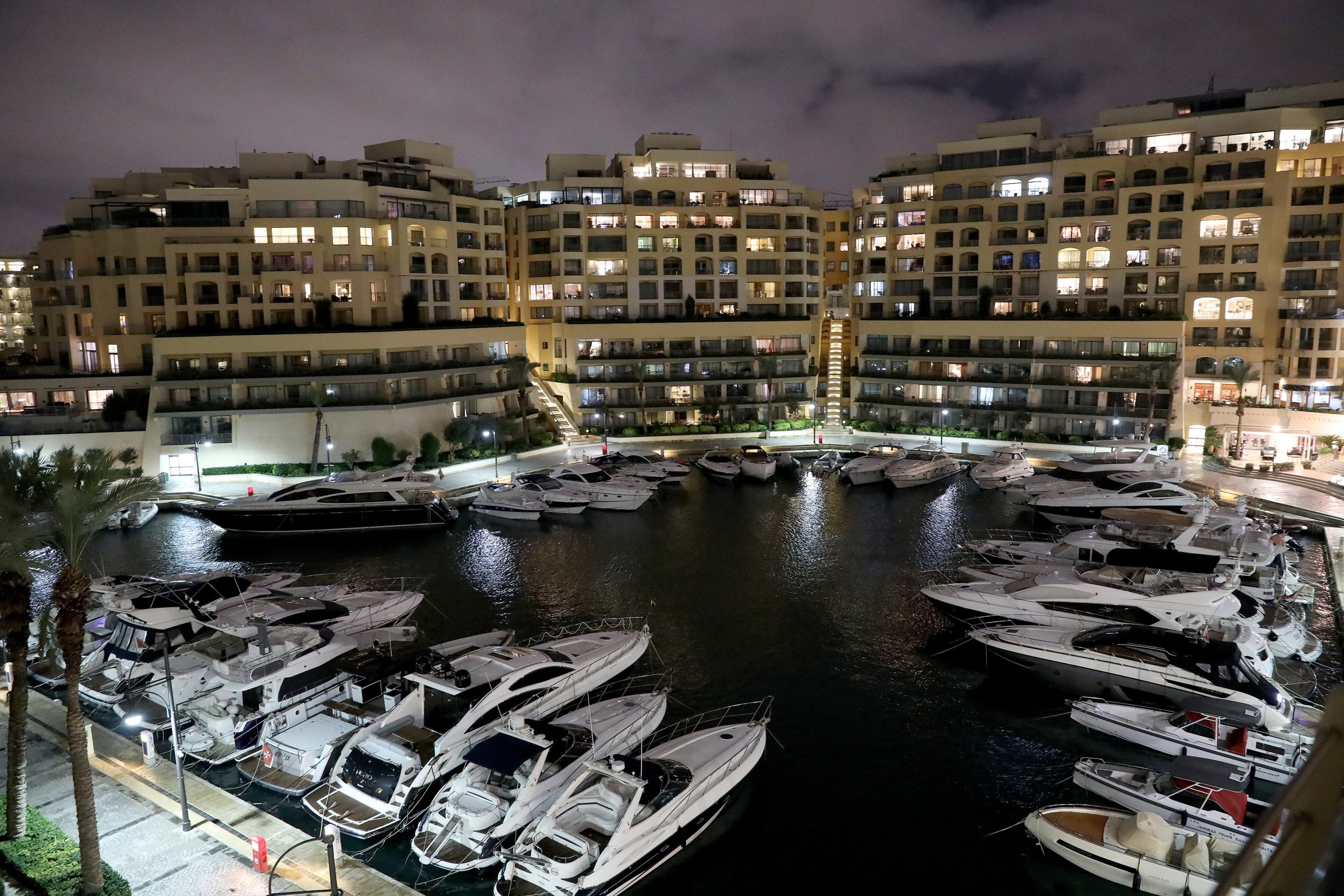 epa08010800 A generic view dated 11 November 2019 of the Portomaso Harbour where the boat belonging to 17 Black owner Yorgen Fenech is berthed after being intercepted at sea by the Armed Forces of Malta and returned to Malta early 20 November 2019, in connection with the Daphne Caruana Galizia murder case. The yacht was seized off the coast of Pembroke soon after it had left Portomaso at 5.30am.  Fenech was arrested and is in police custody, sources said. On Tuesday, Prime Minister Joseph Muscat said he signed a letter that assures a presidential pardon to a man who claims to have information with regard to the assassination of Daphne Caruana Galizia in October 2017.  EPA/DOMENIC AQUILINA