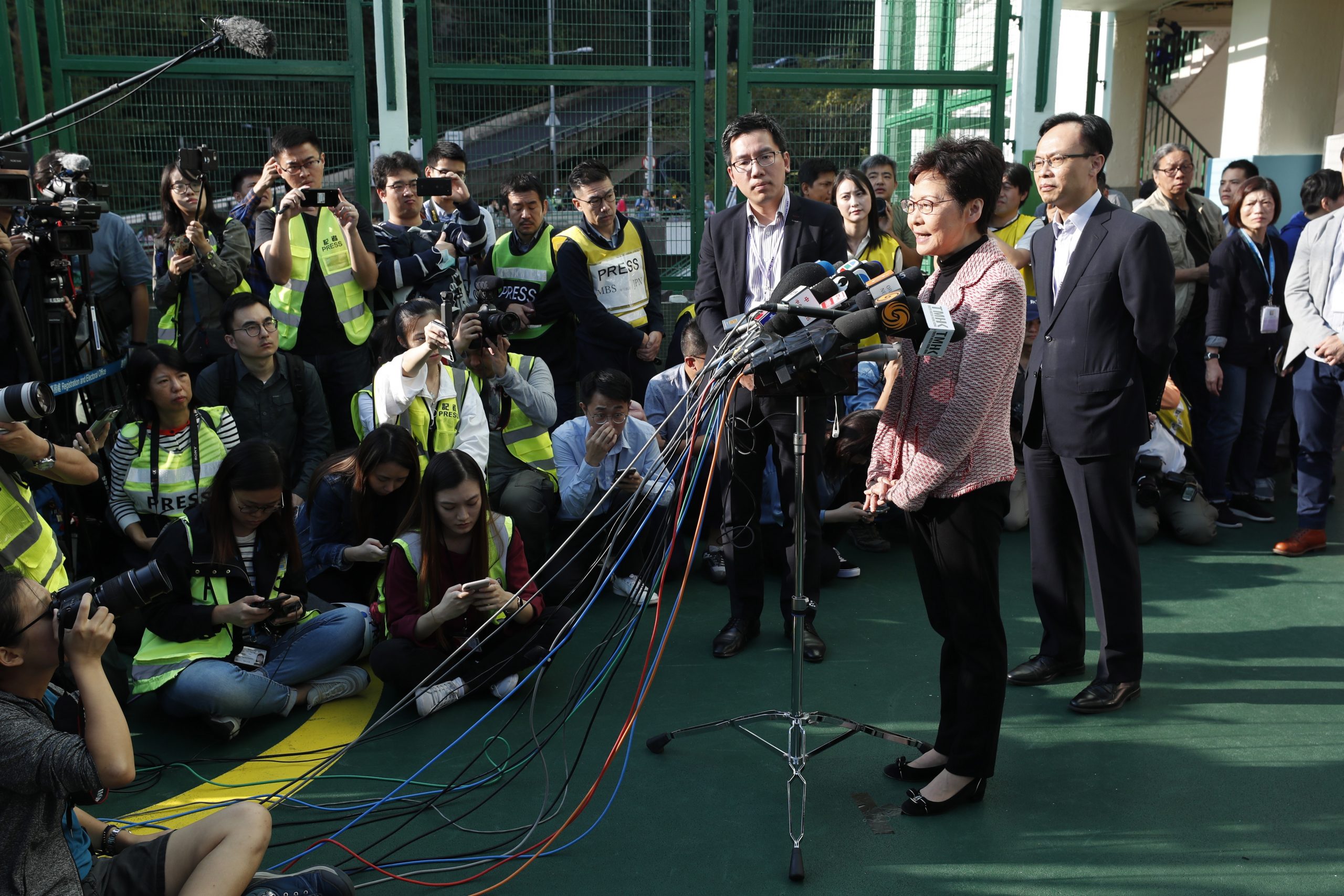 epa08021038 Hong Kong Chief Executive Carrie Lam speaks to media after casted her vote in the District Council Ordinary Election in Hong Kong, China, 24 November 2019. On 24 November 4.13 million registered electors will cast their votes for the 2019 District Council Ordinary Election. Hong Kong is in its sixth month of mass protests, which were originally triggered by a now withdrawn extradition bill, and have since turned into a wider pro-democracy movement.  EPA/JEON HEON-KYUN