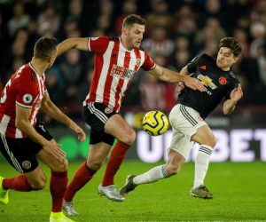 epa08022489 Sheffield United's Jack O'Connell (L) in action with Manchester United's Daniel James (R) during the English Premier League soccer match between Sheffield United and Manchester United held at the Bramhall Lane in Sheffield , Britain, 24 November 2019.  EPA/PETER POWELL EDITORIAL USE ONLY. No use with unauthorized audio, video, data, fixture lists, club/league logos or 'live' services. Online in-match use limited to 120 images, no video emulation. No use in betting, games or single club/league/player publications