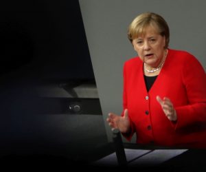 epa08028234 German Chancellor Angela Merkel speaks during a session of the 'Bundestag' German parliament in Berlin, Germany, 27 November 2019. Members of Bundestag will gather to debate on government policy.  EPA/HAYOUNG JEON