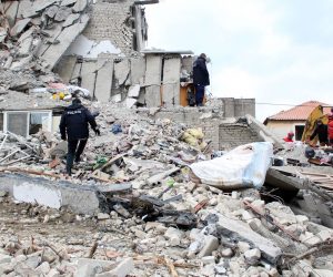 epa08028517 Rescue teams for Natural Disasters from Serbia search for victims in the rubbles of a building after the earthquake in Thumane, Albania, 27 November 2019. Over two hundreed specialist from the EU has arrived in Albania to help after Albania was hit by a 6.4 magnitude earthquake on 26 November 2019, leaving until now over 30 people dead and 200 injured.  EPA/MALTON DIBRA