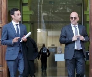 epa08033564 Entrepreneur Yorgen Fenech (R) leaves with an unidentified man the Malta Law Courts, in Valletta, Malta, 29 November, 2019. Fenech's lawyers request to have the chief investigator in the Daphne Caruana Glizia murder case removed.  Maltese authorities had arrested Yorgen Fenech on 20 November as a person of interest in investigations into the October 2017 car bomb murder of Maltese journalist Daphne Caruana Galizia.  EPA/DOMENIC AQUILINA