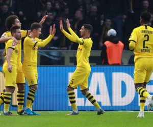 epa08035101 Dortmund's Thorgan Hazard (C) celebrates after scoring the 0:2 during the German Bundesliga soccer match between Hertha BSC and Borussia Dortmund in Berlin, Germany, 30 November 2019.  EPA/HAYOUNG JEON CONDITIONS - ATTENTION: The DFL regulations prohibit any use of photographs as image sequences and/or quasi-video.