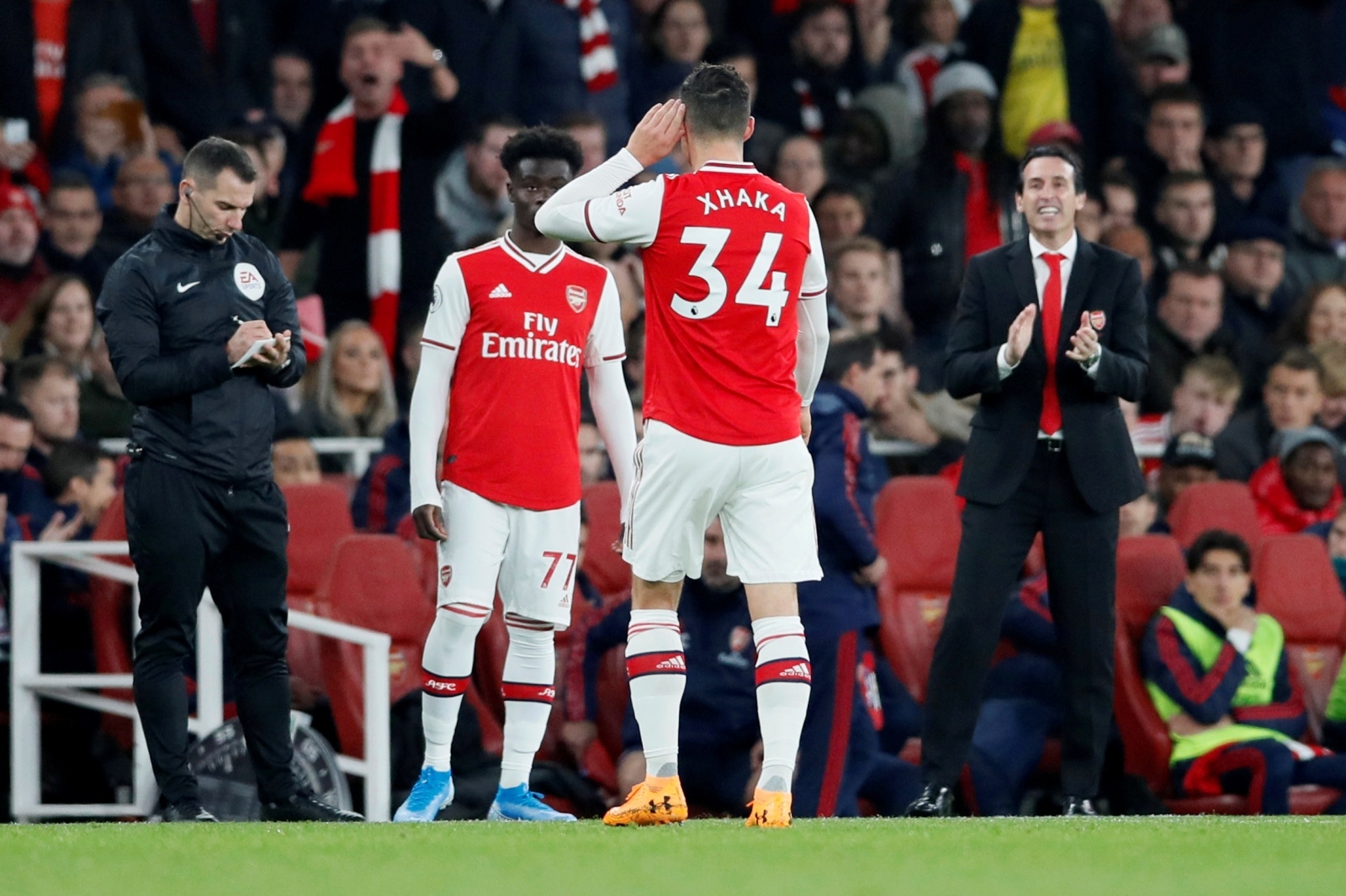 FILE PHOTO: Premier League - Arsenal v Crystal Palace FILE PHOTO: Soccer Football - Premier League - Arsenal v Crystal Palace - Emirates Stadium, London, Britain - October 27, 2019  Arsenal's Granit Xhaka gestures to fans as he is substituted       REUTERS/David Klein  EDITORIAL USE ONLY. No use with unauthorized audio, video, data, fixture lists, club/league logos or "live" services. Online in-match use limited to 75 images, no video emulation. No use in betting, games or single club/league/player publications.  Please contact your account representative for further details./File Photo David Klein