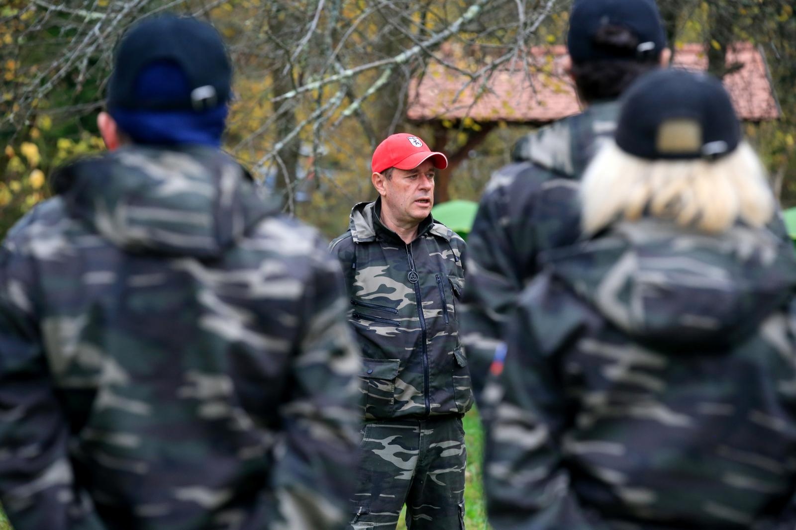 Andrej Sisko leader of Stajerska Varda (Stajerska Guard) is seen with uniformed volunteers while they hold exercises near the border with Croatia in Kostel Andrej Sisko leader of Stajerska Varda (Stajerska Guard) is seen with uniformed volunteers while they hold exercises near the border with Croatia in Kostel, Slovenia November 9, 2019. Picture taken November 9, 2019. REUTERS/Borut Zivulovic BORUT ZIVULOVIC
