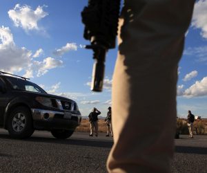 epa07975578 Agents of the Rural Tactical Operations Forces search for people responsible for an attack on a family of Mormons, in Bavispe, Sonora, Mexico, 05 November 2019. At least nine members of a Mormon family were killed on 04 November after their car was ambushed by gunmen.  EPA/LUIS TORRES