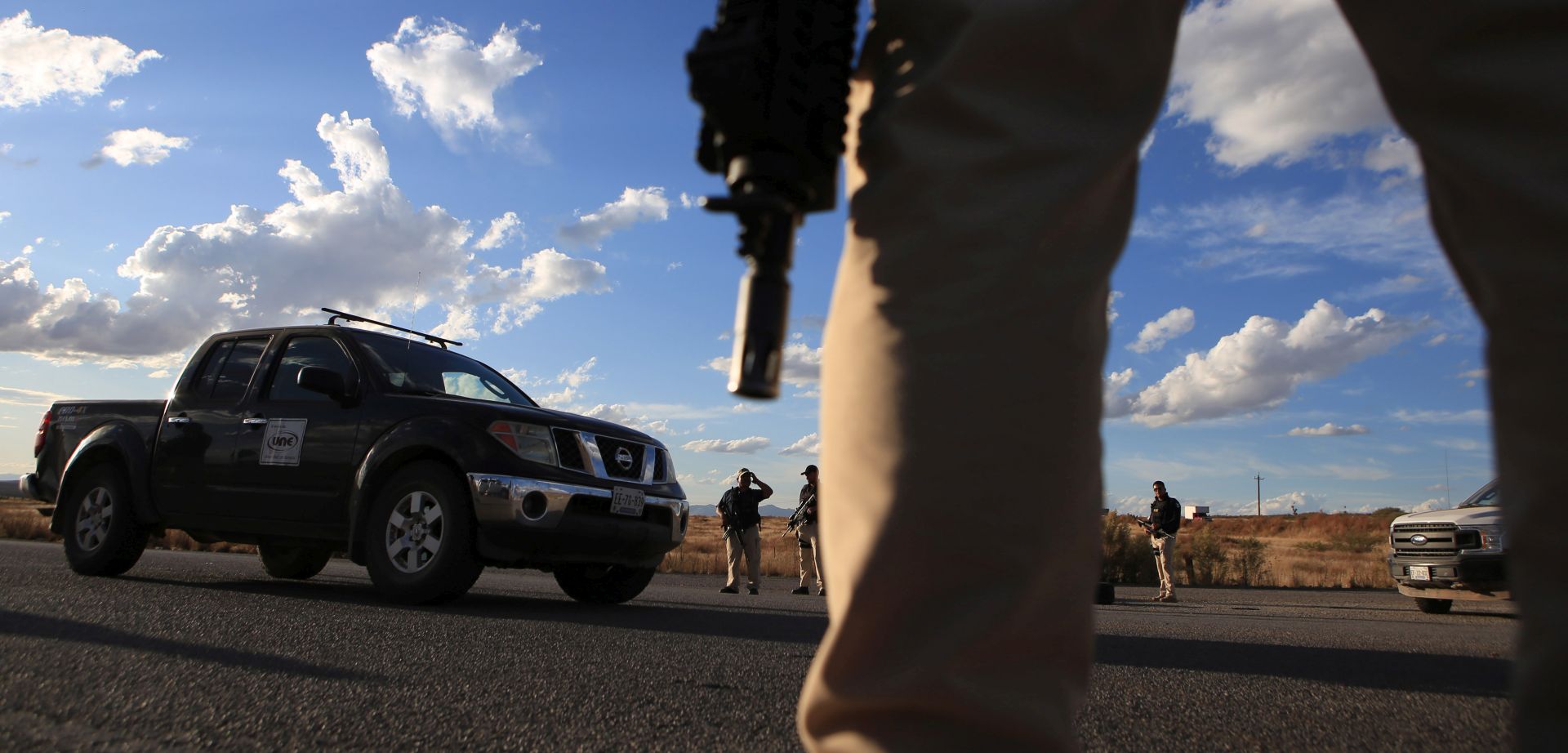 epa07975578 Agents of the Rural Tactical Operations Forces search for people responsible for an attack on a family of Mormons, in Bavispe, Sonora, Mexico, 05 November 2019. At least nine members of a Mormon family were killed on 04 November after their car was ambushed by gunmen.  EPA/LUIS TORRES