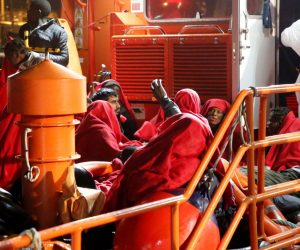 epa08028036 Around 70 migrants arrive to Melilla's Port after they were rescued on a small canoe thirty miles near Melilla's coast, Spain, 26 November 2019. Three migrants died, 10 are missing at sea and five arrived to the port seriously injured.  EPA/FG Guerrero