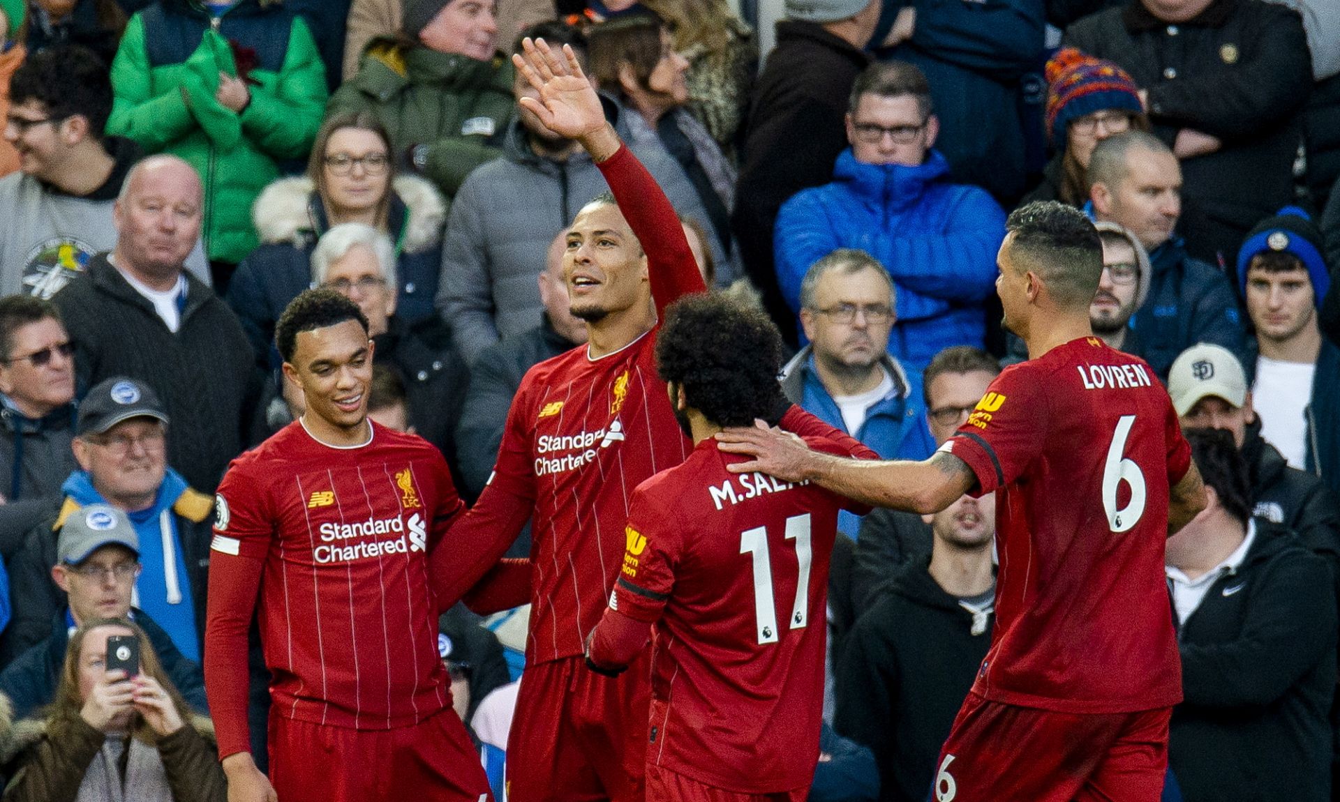 epa08035194 Liverpool's Virgil van Dijk celebrates scoring the second goal goal during the English Premier League soccer match between Liverpool and Brighton & Hove Albion held at the Anfield in Liverpool, Britain, 30 November 2019.  EPA/PETER POWELL EDITORIAL USE ONLY. No use with unauthorized audio, video, data, fixture lists, club/league logos or 'live' services. Online in-match use limited to 120 images, no video emulation. No use in betting, games or single club/league/player publications
