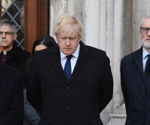epa08039281 Mayor of London, Sadiq Khan (L), Britain's Prime Minister Boris Johnson (C) and Labour party leader Jeremy Corbyn (R) take part in a vigil at the Guildhall  to pay tribute to the victims of the London Bridge terror attack in London, Britain, 02 December 2019. Two members of the public have died and a male suspect has been shot dead by police at a scene on 29 November after a stabbing at London Bridge.  EPA/FACUNDO ARRIZABALAGA