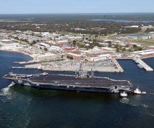 epa08050894 (FILE) - A handout file photo made available by the US Navy shows an aerial view of the USS John F. Kennedy (CV 67) arriving for a port visit at Naval Air Station (NAS) Pensacola, in Pensacola, Florida, USA, 17 March 2004 (issued 07 December 2019). Media reports state that a gunman on 06 December 2019 opened fire inside the Naval Air Station Pensacola killing three people and injuring at least eight others. The attacker, identified as a member of the Saudi Air Force and an aviation student at the base who had been in the country since August 2017, was shot dead by authorities, media added. Officials have not yet determined a motive for the shooting.  EPA/US NAVY/PATRICK NICHOLSs HANDOUT  HANDOUT EDITORIAL USE ONLY/NO SALES