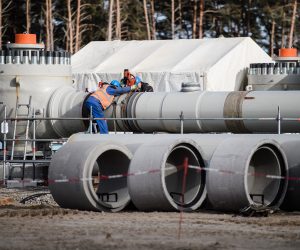 epa08066455 (FILE) - Workers work on a pipeline tube on the construction site of the Nord Stream 2 pipeline in Lubmin, Germany, 26 March 2019 (reissued 12 December 2019). The Nord Stream 2 pipeline with its length of 1230 kilometers runs from the Russian Baltic coast to Germany, subsea. The US House of Representatives has introduced sanctions against companies and individuals involved in the Nord Stream 2 pipeline project.  EPA/CLEMENS BILAN