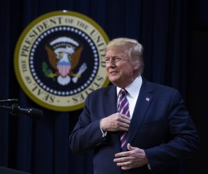 epa08082580 US President Donald J. Trump delivers remarks in front of the seal of the US President, at an event entitled 'Summit on Transforming Mental Health Treatment to Combat Homelessness, Violence and Substance Abuse', in the Eisenhower Executive Office Building on the White House complex in Washington, DC, USA, 19 December 2019.  EPA/MICHAEL REYNOLDS / POOL