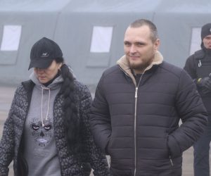 epa08093466 Prisoners walk towards busses before a prisoner exchange between Ukrainian and pro-Russian rebels' sides, not far from the Maiorske checkpoint, Donetsk area, Ukraine, 29 December 2019. According to media reports, the Ukrainian side will swap prisoners who were captured in Ukrainian-controlled territory for Ukrainian citizens, including prisoners of war (POW) that were held hostages in occupied Donbas at the Maiorske crossing checkpoint, on the contact line between the warring parties near the pro-Russian militant-occupied town of Horlivka in Donetsk region. The agreement, reached during the summit of the Normandy Four leaders in Paris on 09 December 2019, sets the exchange between Kyiv and Donbas to be carried out before the end of the year.  EPA/YEVGEN HONCHARENKO