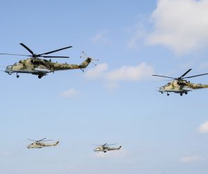 Russian helicopters fire during military exercises in Dagestan Russian Mi-35 and Mi-24 attack helicopters fly during the military exercises known as "Centre-2019" at the range Turali on the Caspian Sea coast in the Republic of Dagestan, Russia September 20, 2019. REUTERS/Sergey Pivovarov SERGEY PIVOVAROV