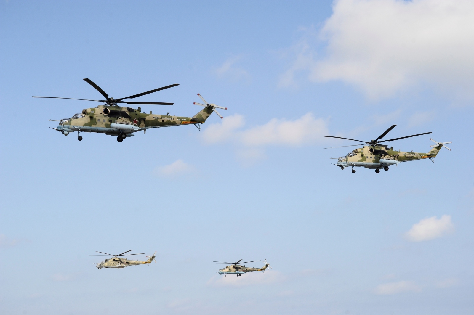 Russian helicopters fire during military exercises in Dagestan Russian Mi-35 and Mi-24 attack helicopters fly during the military exercises known as "Centre-2019" at the range Turali on the Caspian Sea coast in the Republic of Dagestan, Russia September 20, 2019. REUTERS/Sergey Pivovarov SERGEY PIVOVAROV