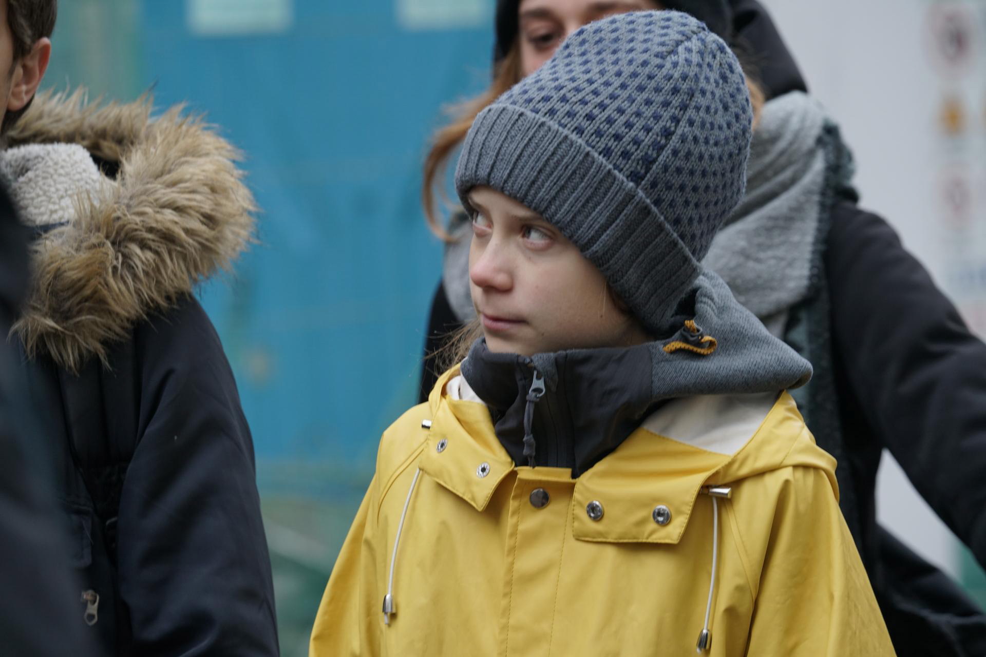 epa08068577 Swedish environmental activist Greta Thunberg walks at Piazza Castello, Turin, Italy, 13 December 2019. Thunbeg will attend the 'March for Climate', demanding action against climate change later in the day.  EPA/Tino Romano