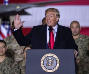 epa08084324 US President Donald J. Trump (C) speaks on stage during the signing ceremony for the National Defense Authorization Act for Fiscal Year 2020 inside Hangar Six at Joint Base Andrews in Suitland, Maryland, USA, 20 December 2019. The 738 billion US dollar military funding bill includes the creation of the Space Force.  EPA/ERIK S. LESSER