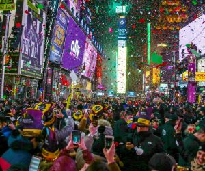 epaselect epa08097107 Revelers take part in New Year's Eve celebrations at Time Square, New York, USA, 01 January 2020.  EPA/ANGEL COLMENARES