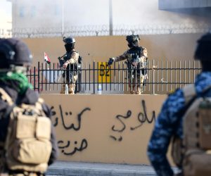 epa08098092 Iraqi Anti-terrorism Forces and police forces stand guard outside the U.S embassy, in central Baghdad, Iraq, 01 January 2020. Supporters of Iranian-backed militias have withdrawn from the US Embassy in Baghdad following two days of sit-ins after a deadly US airstrike that killed 25 fighters of the Iran-backed militia on 29 December.  EPA/MURTAJA LATEEF