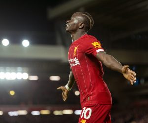 epa08099027 Liverpool's Sadio Mane celebrates after scoring the second goal making the score 2-0 during the English Premier League soccer match between Liverpool and Sheffield United at Anfield, Liverpool, Britain, 02 January 2020.  EPA/PETER POWELL EDITORIAL USE ONLY. No use with unauthorized audio, video, data, fixture lists, club/league logos or 'live' services. Online in-match use limited to 120 images, no video emulation. No use in betting, games or single club/league/player publications