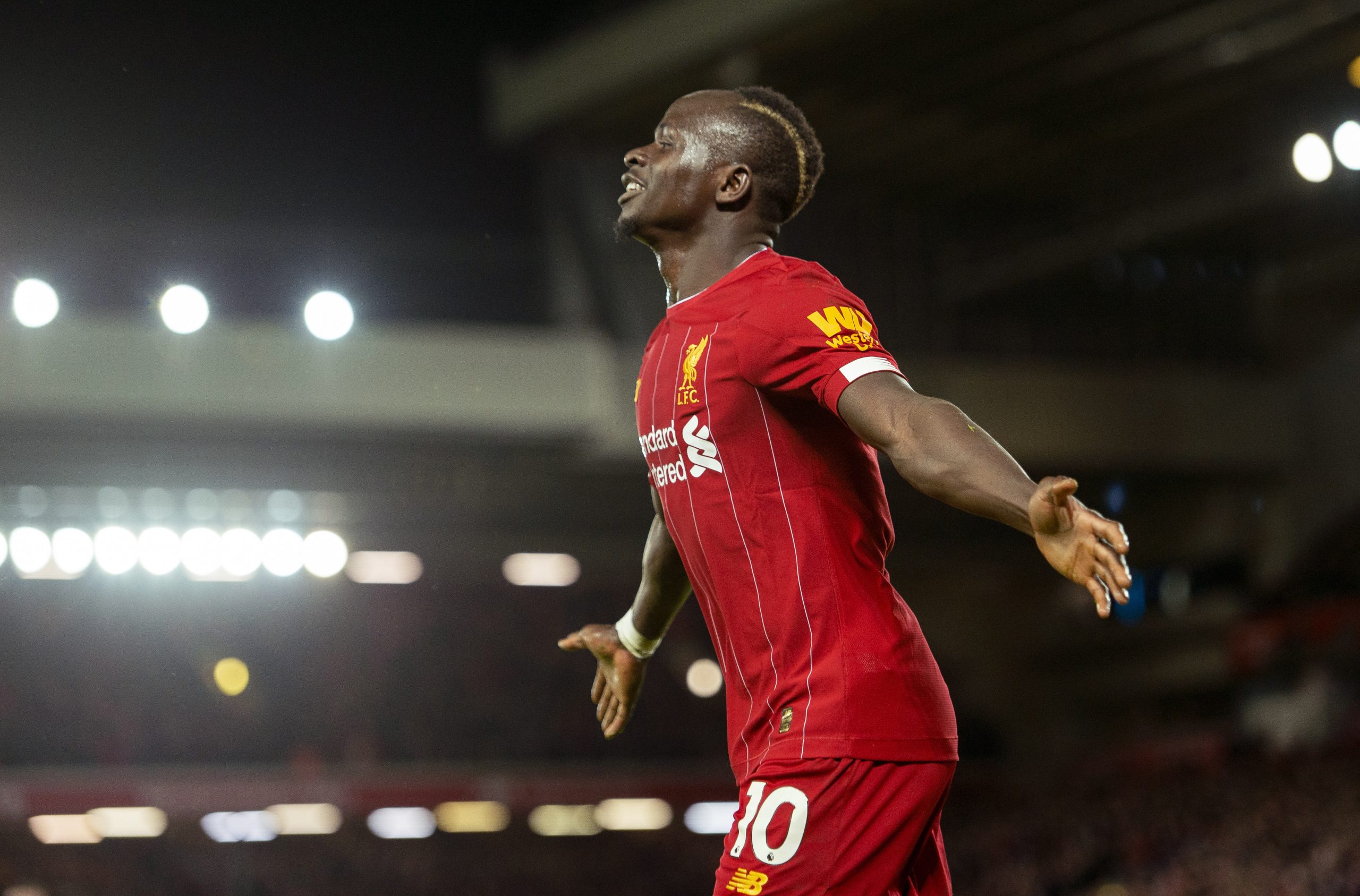 epa08099027 Liverpool's Sadio Mane celebrates after scoring the second goal making the score 2-0 during the English Premier League soccer match between Liverpool and Sheffield United at Anfield, Liverpool, Britain, 02 January 2020.  EPA/PETER POWELL EDITORIAL USE ONLY. No use with unauthorized audio, video, data, fixture lists, club/league logos or 'live' services. Online in-match use limited to 120 images, no video emulation. No use in betting, games or single club/league/player publications
