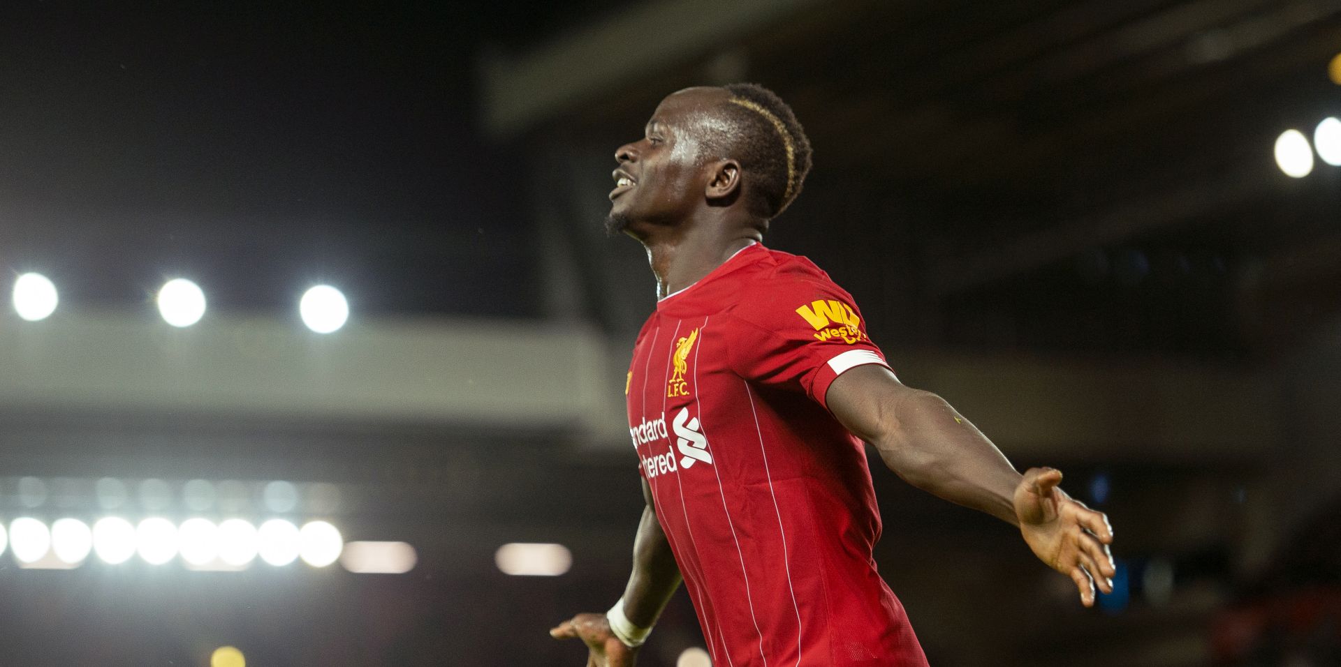 epa08099027 Liverpool's Sadio Mane celebrates after scoring the second goal making the score 2-0 during the English Premier League soccer match between Liverpool and Sheffield United at Anfield, Liverpool, Britain, 02 January 2020.  EPA/PETER POWELL EDITORIAL USE ONLY. No use with unauthorized audio, video, data, fixture lists, club/league logos or 'live' services. Online in-match use limited to 120 images, no video emulation. No use in betting, games or single club/league/player publications