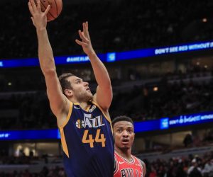 epa08099160 Utah Jazz forward Bojan Bogdanovic of Croatia (L) shoots over Chicago Bulls center Wendell Carter Jr. (R) during the NBA game between the Utah Jazz and the Chicago Bulls at the United Center in Chicago, Illinois, USA, 02 January 2020.  EPA/TANNEN MAURY SHUTTERSTOCK OUT