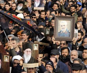 epa08099832 Iranians holding pictures of Supreme Leader Ali Khamenei and of Iranian Revolutionary Guards Corps (IRGC) Lieutenant general and commander of the Quds Force Qasem Soleimani take to the streets during an anti-US demonstration to condemn the killing of Soleimani, after Friday prayers in Tehran, Iran, 03 January 2020. The Pentagon announced that Iran's Quds Force leader Qasem Soleimani and Iraqi militia commander Abu Mahdi al-Muhandis were killed on 03 January 2020 following a US airstrike at Baghdad's international airport. The attack comes amid escalating tensions between Tehran and Washington.  EPA/ABEDIN TAHERKENAREH