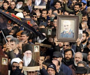 epa08099832 Iranians holding pictures of Supreme Leader Ali Khamenei and of Iranian Revolutionary Guards Corps (IRGC) Lieutenant general and commander of the Quds Force Qasem Soleimani take to the streets during an anti-US demonstration to condemn the killing of Soleimani, after Friday prayers in Tehran, Iran, 03 January 2020. The Pentagon announced that Iran's Quds Force leader Qasem Soleimani and Iraqi militia commander Abu Mahdi al-Muhandis were killed on 03 January 2020 following a US airstrike at Baghdad's international airport. The attack comes amid escalating tensions between Tehran and Washington.  EPA/ABEDIN TAHERKENAREH