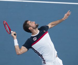 epa08101415 Marin Cilic of Croatia serves the ball to Dennis Novak of Austria during day two of the ATP Cup tennis tournament at Ken Rosewall Arena in in Sydney, Australia, 04 January 2020.  EPA/CRAIG GOLDING EDITORIAL USE ONLY AUSTRALIA AND NEW ZEALAND OUT