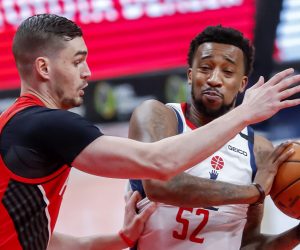 epa08100906 Washington Wizards guard Jordan McRae (R) in action against Portland Trail Blazers forward Mario Hezonja (L) of Croatia during the first half of the NBA basketball game between the Portland Trail Blazers and the Washington Wizards at Capital One Arena in Washington, DC, USA, 03 January 2020.  EPA/ERIK S. LESSER  SHUTTERSTOCK OUT