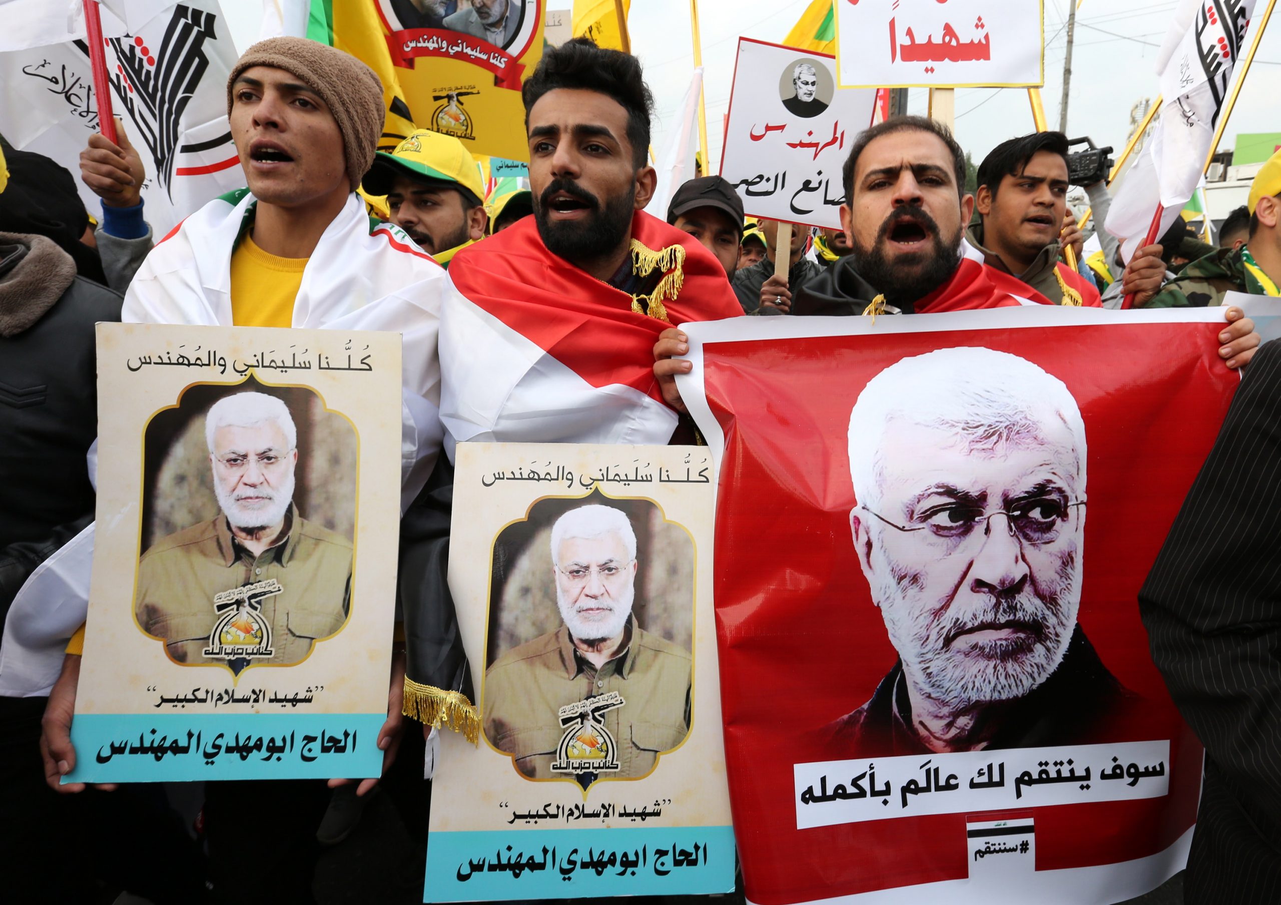 epa08102199 People attend a funeral procession of slain Abu Mahdi al-Muhandis and Qassem Soleimani in central Baghdad, Iraq, 04 January 2020. Thousands of Iraqi Shiite armed groups members have joined the funeral procession in Baghdad for Iraqi militia commander Abu Mahdi al-Muhandis and Qassem Soleimani, the head of Iran's Islamic Revolutionary Guard Corps' elite Quds Force, and the eight others killed in a US drone strike at the Baghdad international airport on 03 January 2020.  EPA/AHMED JALIL  EPA-EFE/AHMED JALIL