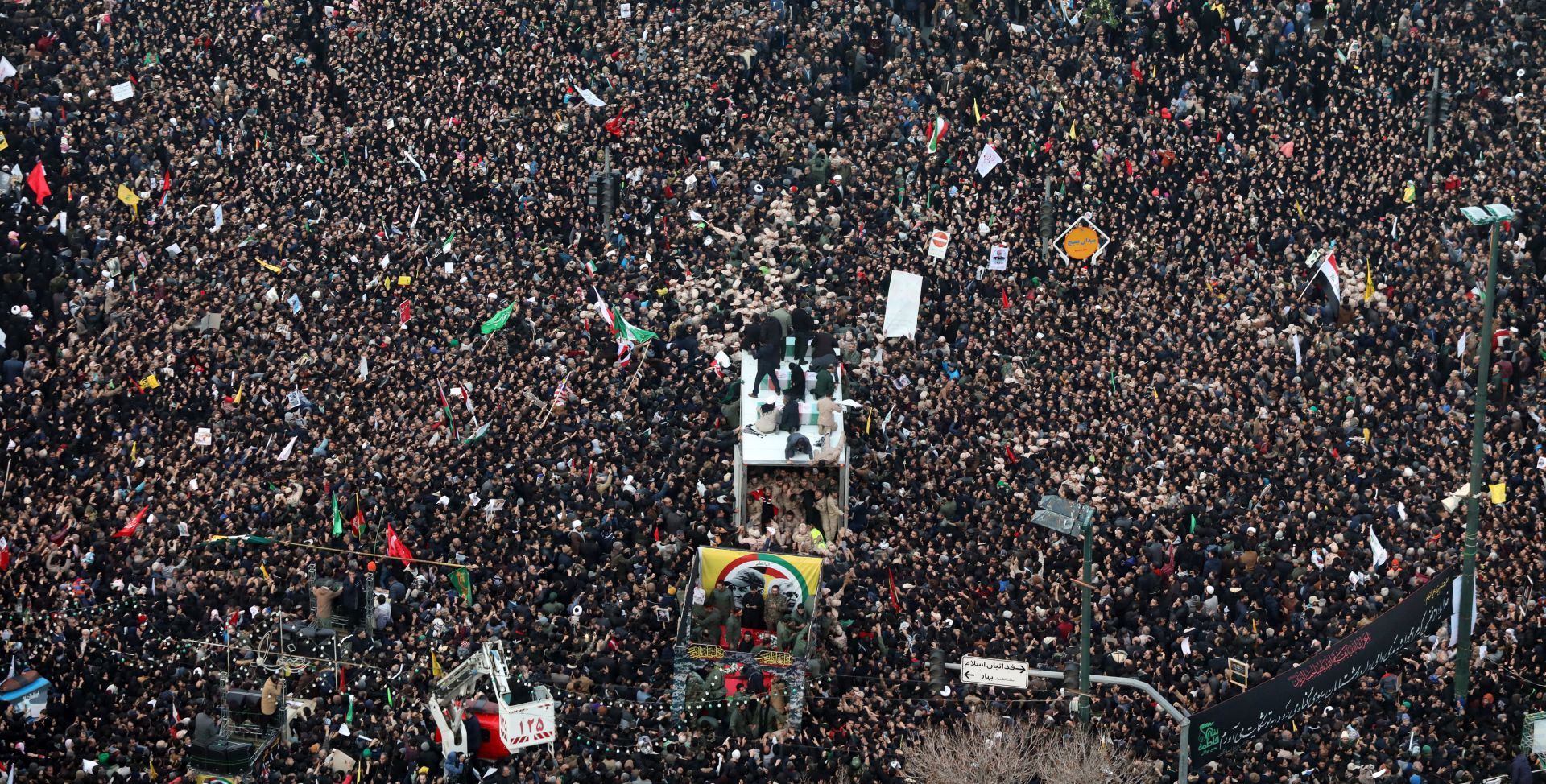 epa08104520 Iranians carrying the coffin of late Iranian Revolutionary Guards Corps (IRGC) Lieutenant general and commander of the Quds Force Qasem Soleimani in the city of Mashhad, northeast Iran, 05 January 2020. The Pentagon announced that Iran's Quds Force leader Qasem Soleimani and Iraqi militia commander Abu Mahdi al-Muhandis were killed on 03 January 2020 following a US airstrike at Baghdad's international airport. The attack comes amid escalating tensions between Tehran and Washington.  EPA/Mohammad Hossein Taghi