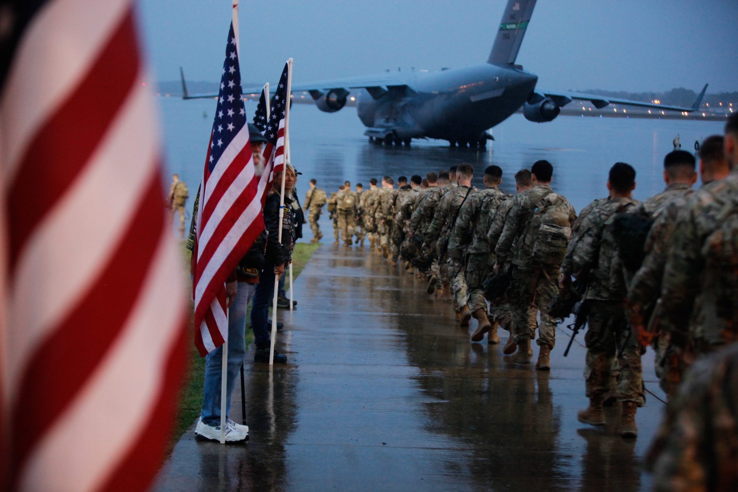 epa08110618 A handout photo made available by the US Army shows Paratroopers assigned to 1st Brigade Combat Team, 82nd Airborne Division preparing equipment and boarding aircraft bound for the US Central Command area of operations in the Middle East, from Fort Bragg, North Carolina, USA, 04 January 2020 (issued 07 January 2020). Tensions in the Middle East region are high following the killing of Iranian general Qasem Soleimani in a US airstrike in Baghdad on 03 January 2019.  EPA/HUBERT DELANY / US ARMY HANDOUT  HANDOUT EDITORIAL USE ONLY/NO SALES