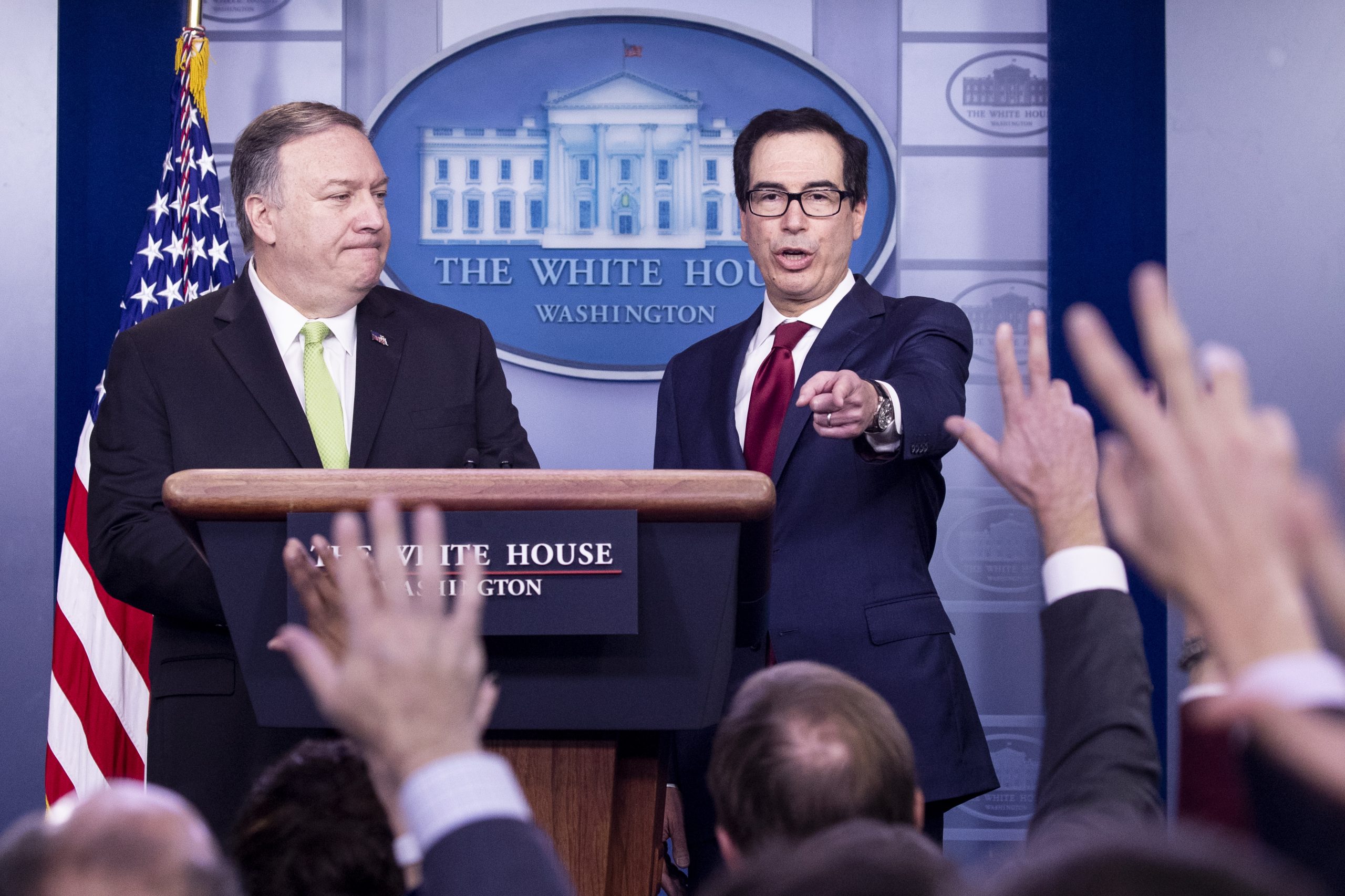 epa08117329 US Secretary of State Mike Pompeo (L) and US Treasury Secretary Steven Mnuchin (R) participate in a news conference held to announce new sanctions against Iran, in the James Brady Press Briefing Room of the White House, in Washington, DC, 10 January 2020. The sanctions are in response to Iran launching missile strikes against two military bases in Iraq that house US forces, 08 January. The Iranian strikes were in retaliation to the killing of Iranian Revolutionary Guards Corps Lieutenant general and commander of the Quds Force, Qasem Soleimani, by a US drone strike in Baghdad.  EPA/MICHAEL REYNOLDS