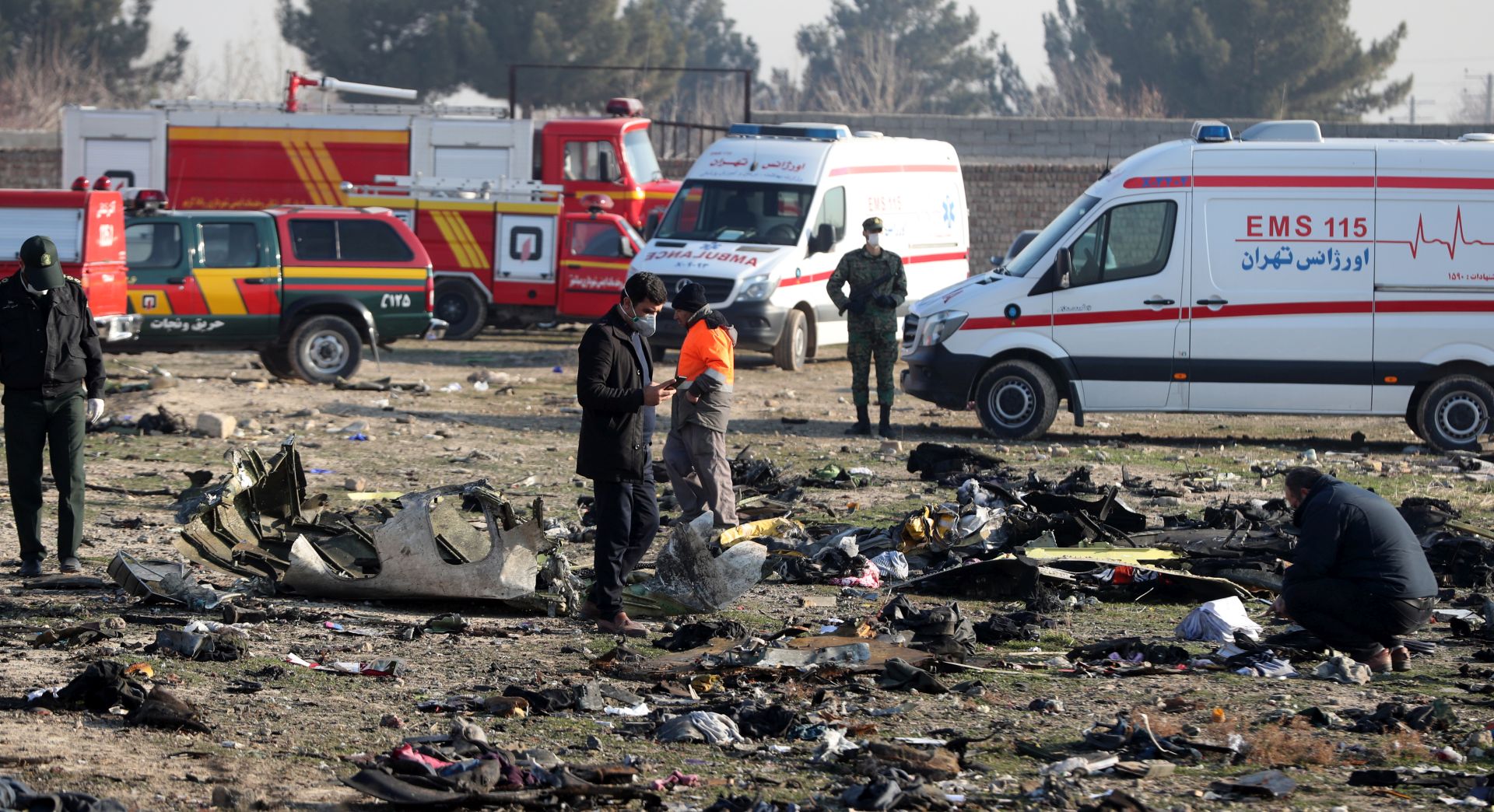epa08118607 (FILE) - Officials inspect the wreckage after a Ukraine International Airlines Boeing 737-800 carrying 176 people crashed near Imam Khomeini Airport in Tehran, killing everyone on board, in Shahriar, Iran, 08 January 2020 (reissued 11 January 2020). According to media reports, the Iranian military released a statement on 11 January claiming that Ukraine International Airlines flight 752 was shot down due to a human error.  EPA/ABEDIN TAHERKENAREH