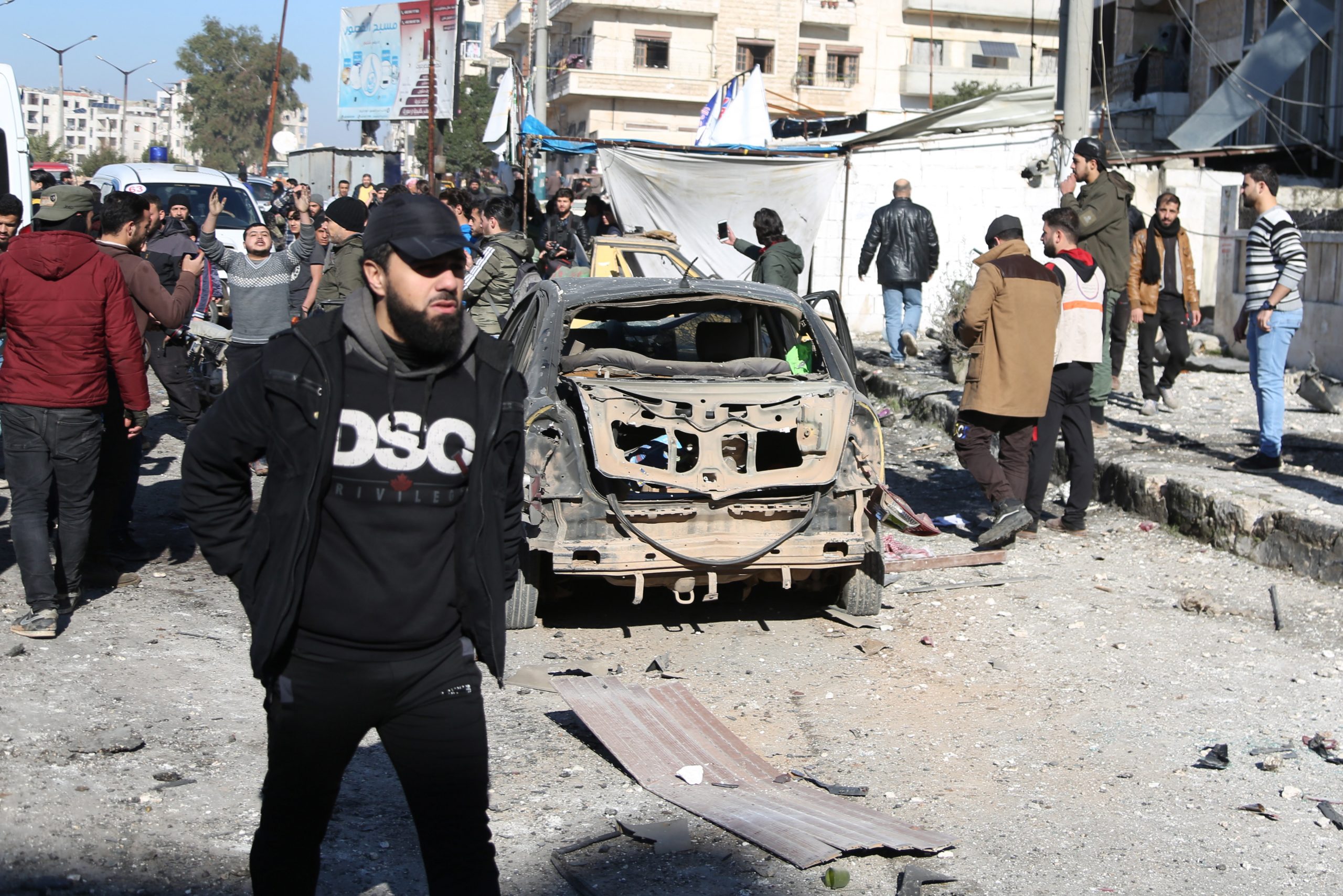 epa08119309 People inspect the damage after air strike targeting rebel-held area a day after an agreement on a ceasefire in Idlib, Syria, 11 January 2020. According to local sources, seven people were killed in the strike and 10 others injured. Media reports on 10 January state Russia and Turkey agreed on a ceasefire in Idlib to allow humanitarian aid delivery for civilians after thousands fled the government bombardment targeting rebel-held area. While Russian defence ministry officials said the ceasefire began on 09 January, Turkish defence officials announced the ceasefire will begin by midnight 12 January.  EPA/YAHYA NEMAH