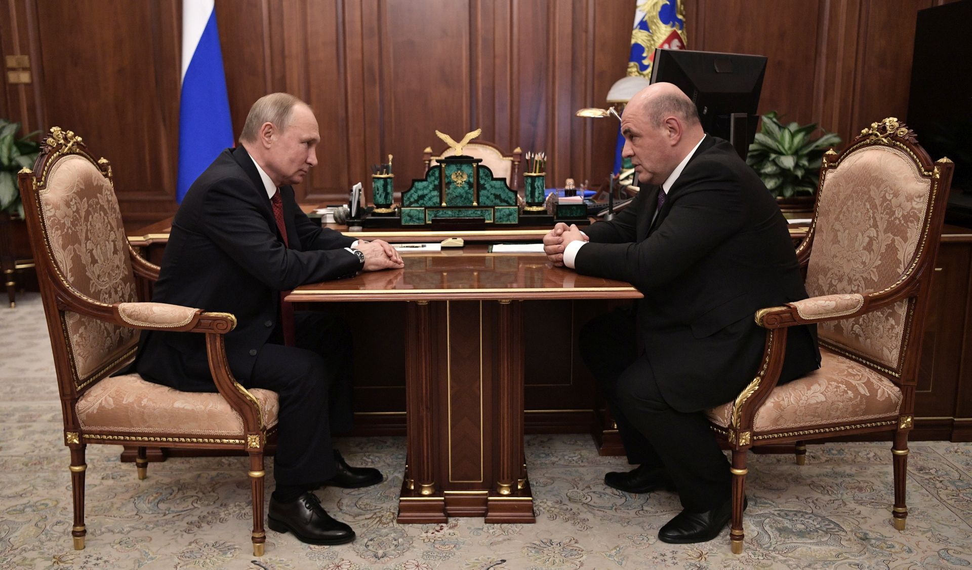 epa08130960 Russian Federal Tax Service Head Mikhail Mishustin (R) attends a meeting with Russian President Vladimir Putin (L) at the Kremlin in Moscow, Russia, 15 January 2020. Russian President Vladimir Putin submitted to the State Duma a candidacy of Russian Federal Taxation Service Head Mikhail Mishustin for the post of Russian Prime Minister.  EPA/ALEXEY NIKOLSKY / SPUTNIK / KREMLIN POOL MANDATORY CREDIT