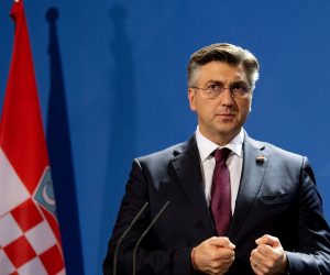 epa08133794 Croatian Prime Minister Andrej Plenkovi speaks as he attends a press statement with German Chancellor Angela Merkel at the Chancellery in Berlin, Germany, 16 January 2020. Merkel and Plenkovic met for bilateral talks.  EPA/FILIP SINGER