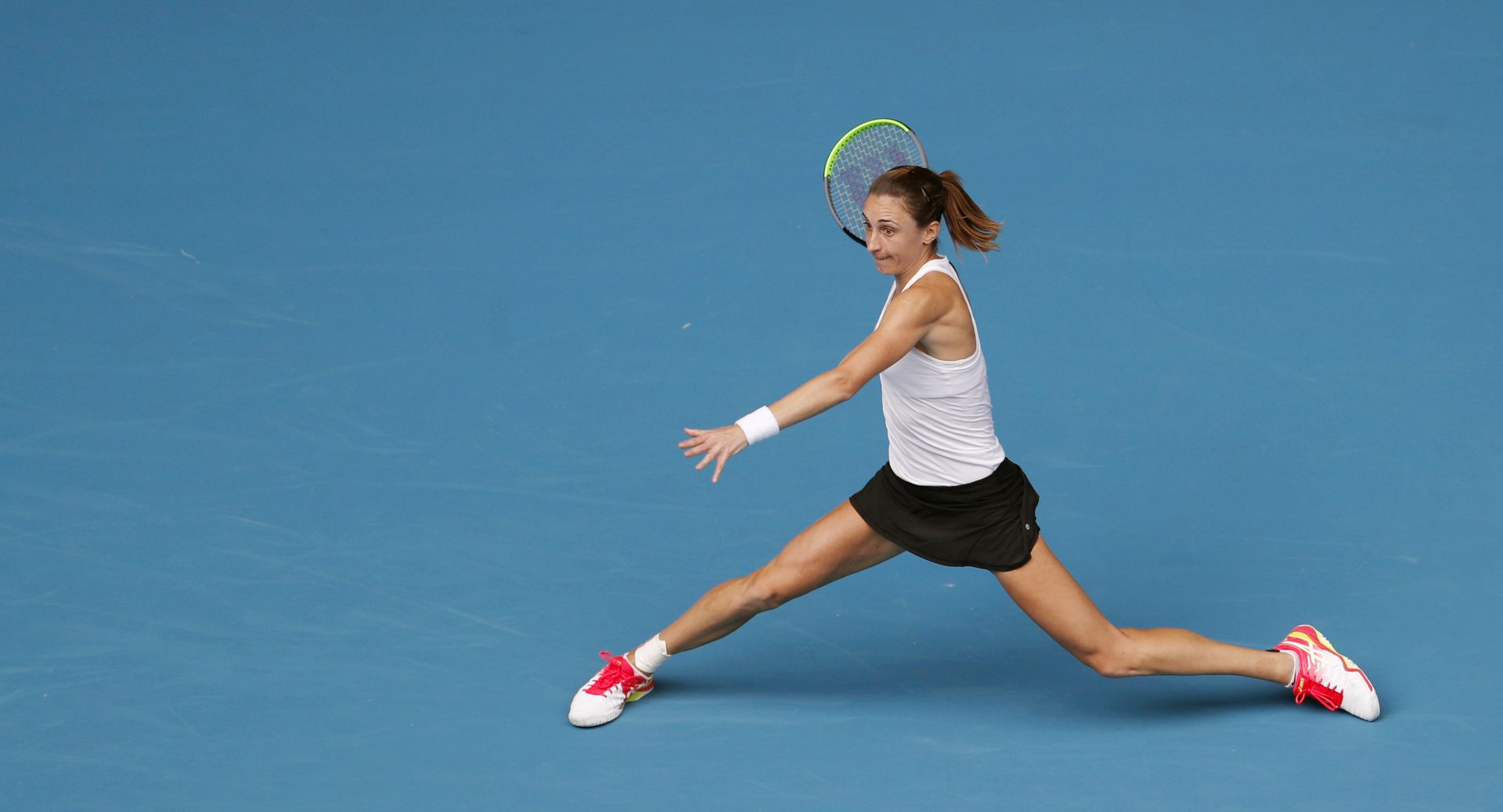 epa08149189 Petra Martic of Croatia in action during her women's singles second round match against Julia Goerges of Germany at the Australian Open Grand Slam tennis tournament in Melbourne, Australia, 22 January 2020. EPA/ROMAN PILIPEY