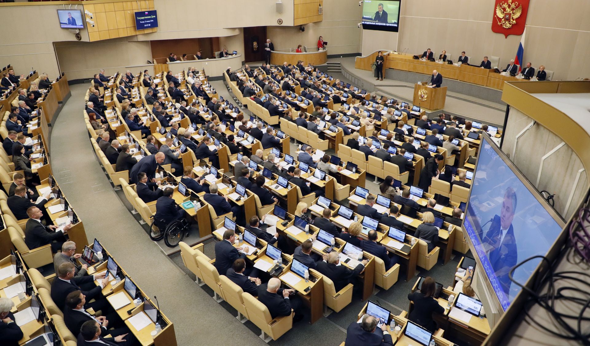 epa08153578 Deputies of the State Duma attend a plenary session of the State Duma, the Lower House of the Federal Assembly of Russia, in Moscow, Russia, 23 January 2020. The State Duma (Russian parliament) is set for the first reading of President Putin's proposed Constitution amendments.  EPA/MAXIM SHIPENKOV