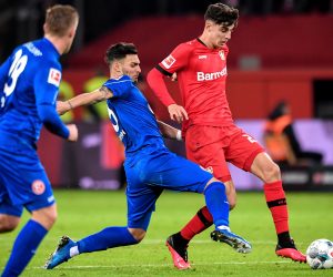 epa08167600 Duesseldorf's Kaan Ayhan (C) in action against Leverkusen's Kai Havertz (R) during the German Bundesliga soccer match between Bayer Leverkusen and Fortuna Duesseldorf at BayArena in Leverkusen, Germany, 26 January 2020.  EPA/SASCHA STEINBACH CONDITIONS - ATTENTION: The DFL regulations prohibit any use of photographs as image sequences and/or quasi-video.